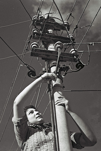 Female electrician at work