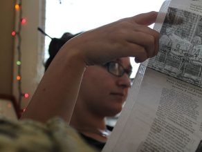 reading the newspaper